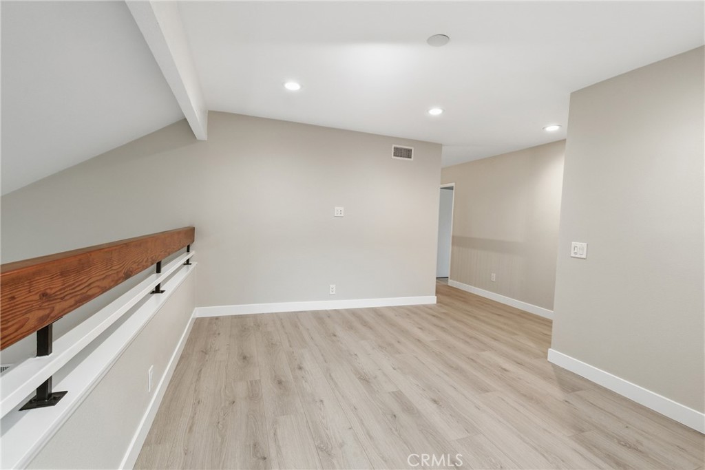 Upstairs Den open to entrance. - 25302 Neptune Drive, Dana Point CA 92629 - photo 20
