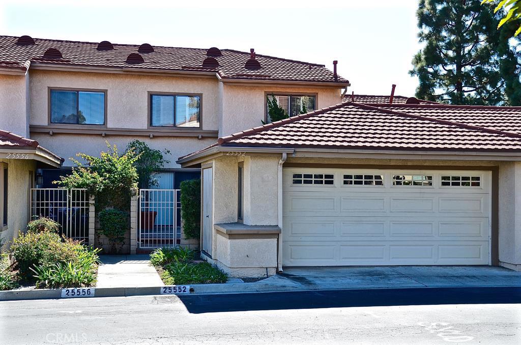Two car garage leading into the front courtyard. - 25552 Mainsail Way, Dana Point CA 92629 - photo 1
