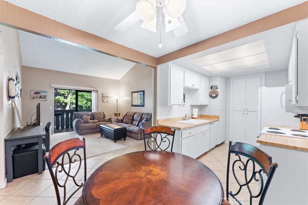 Glass slider off the living room to the private patio. - 25611 Quail Run 32, Dana Point CA 92629 - photo 3