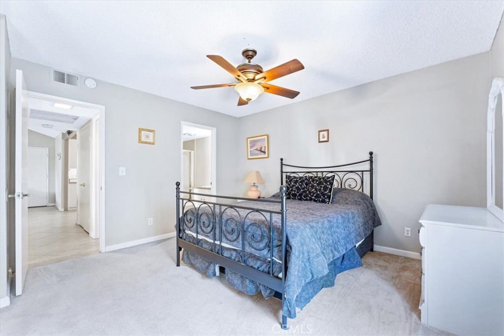 The second bedroom which is attached to the second full bath. - 25611 Quail Run 32, Dana Point CA 92629 - photo 11