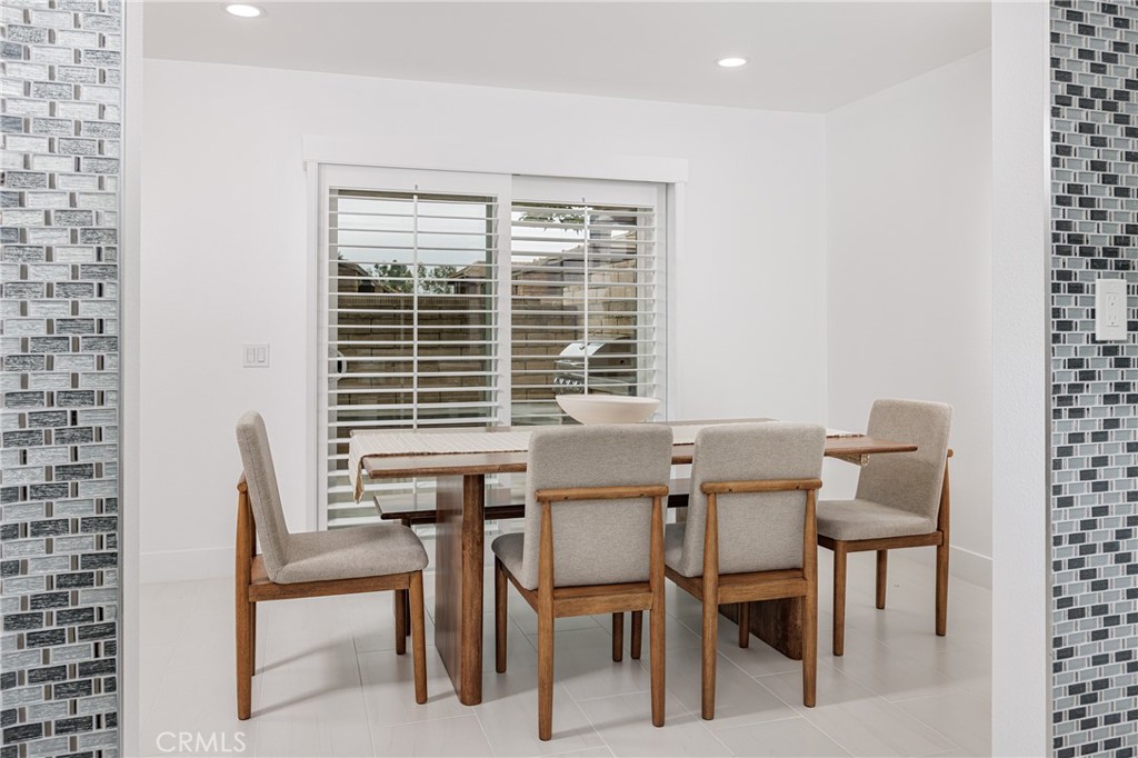 From Living Room Looking into the Dining Room. BBQ to Left - 25656 Fishermans Drive 221, Dana Point CA 92629 - photo 4