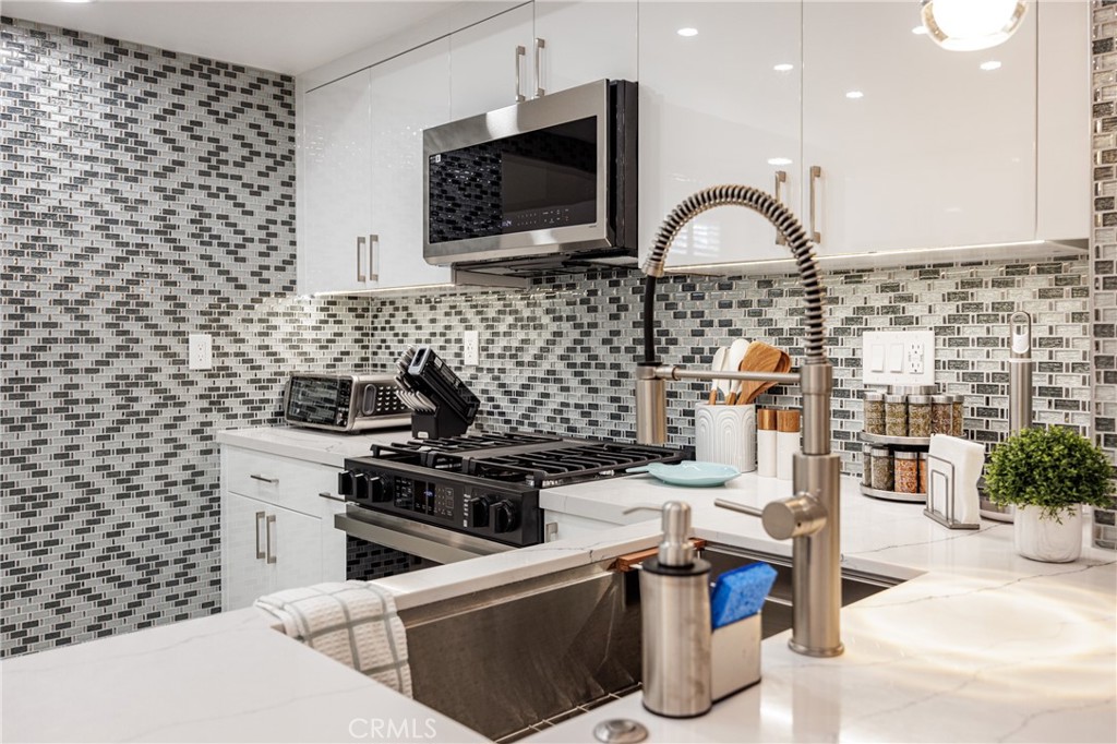 Kitchen with New Appliances - 25656 Fishermans Drive 221, Dana Point CA 92629 - photo 5