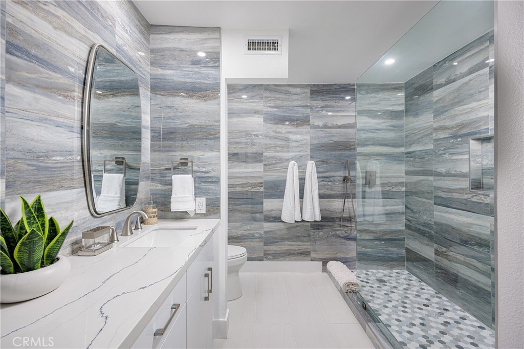 Elegant Walk-In Shower Primary Bathroom - 25656 Fishermans Drive 221, Dana Point CA 92629 - photo 15