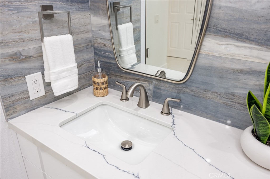 Quartz Countertops in the Primary Bathroom - 25656 Fishermans Drive 221, Dana Point CA 92629 - photo 17