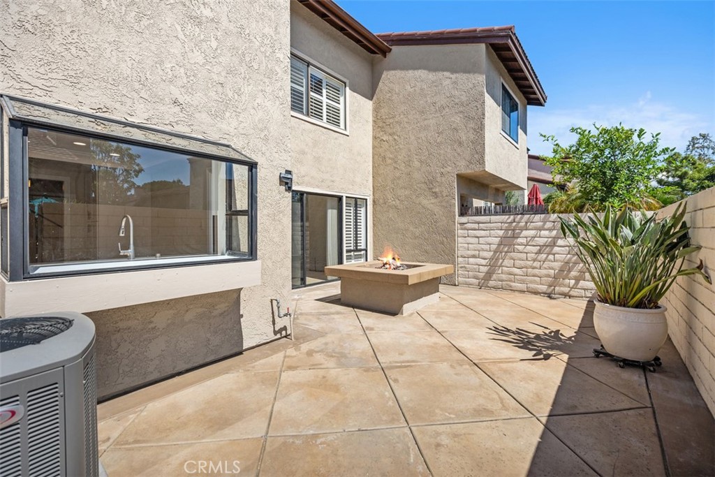 Cozy up to the firepit for entertaining or quiet relaxation. Great patio for BBQs! - 25716 Harbor Point Dr. 178, Dana Point CA 92629 - photo 9