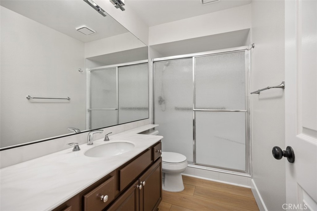 Downstairs bathroom with remodeled large shower - 25716 Harbor Point Dr. 178, Dana Point CA 92629 - photo 10