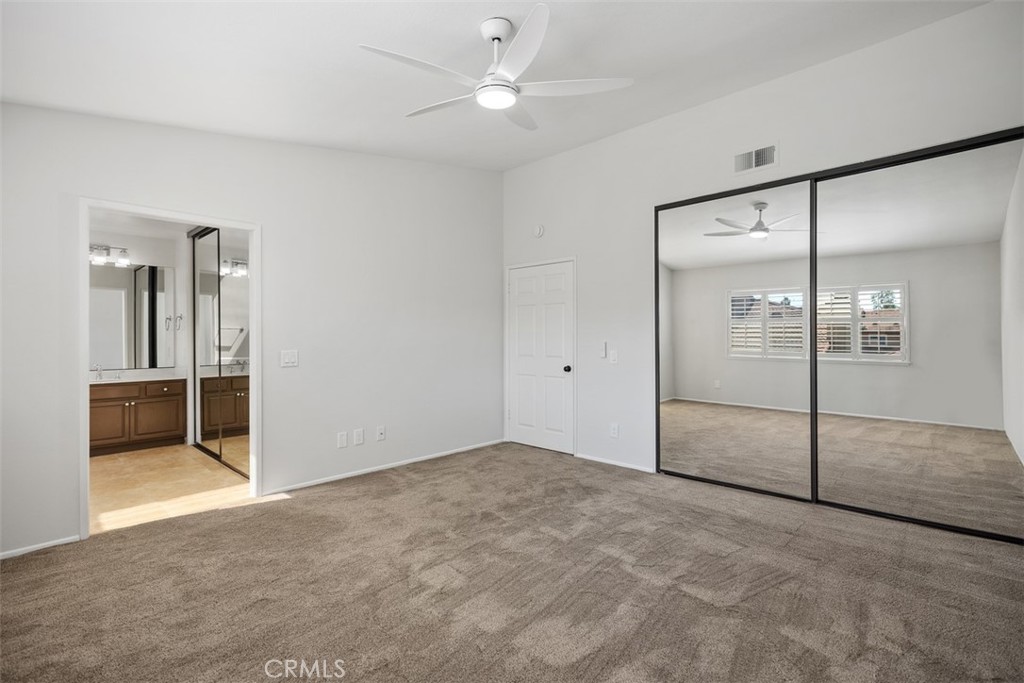 Primary ensuite bedroom with ample closet space - 25716 Harbor Point Dr. 178, Dana Point CA 92629 - photo 14