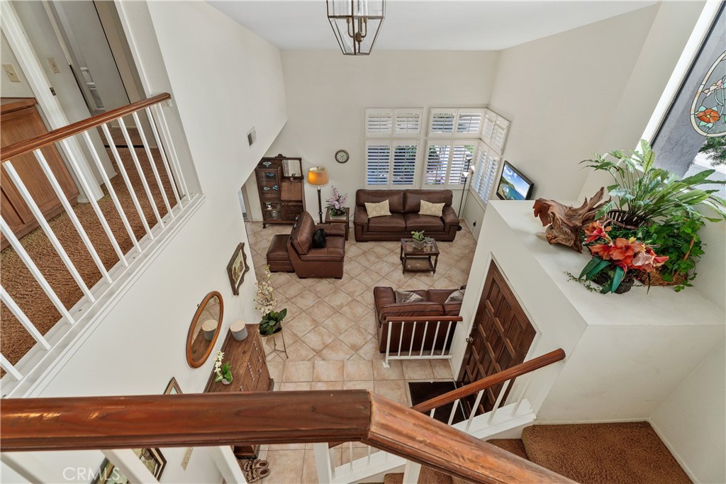2-story living room from the upstairs landing - 25742 Shell Drive 189, Dana Point CA 92629 - photo 6