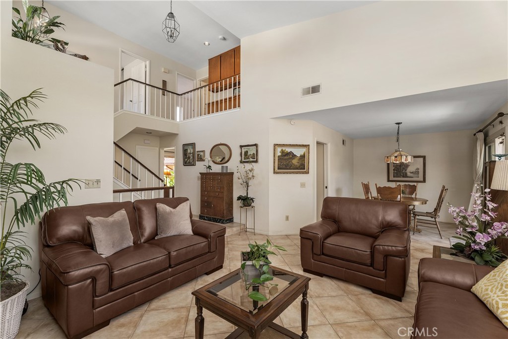 Living room open to the dining area - 25742 Shell Drive 189, Dana Point CA 92629 - photo 9