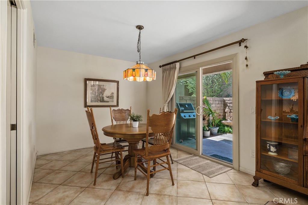 Dining area with slider to the rear patio - 25742 Shell Drive 189, Dana Point CA 92629 - photo 10