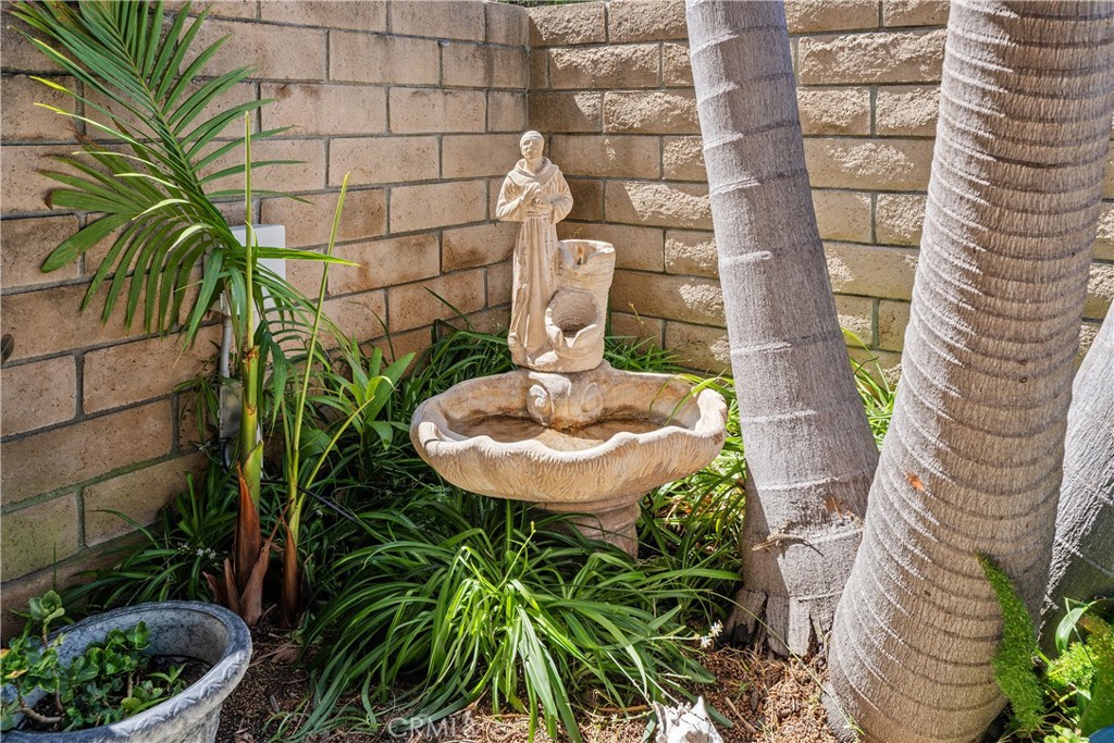 Private rear patio with mature palms - 25742 Shell Drive 189, Dana Point CA 92629 - photo 12