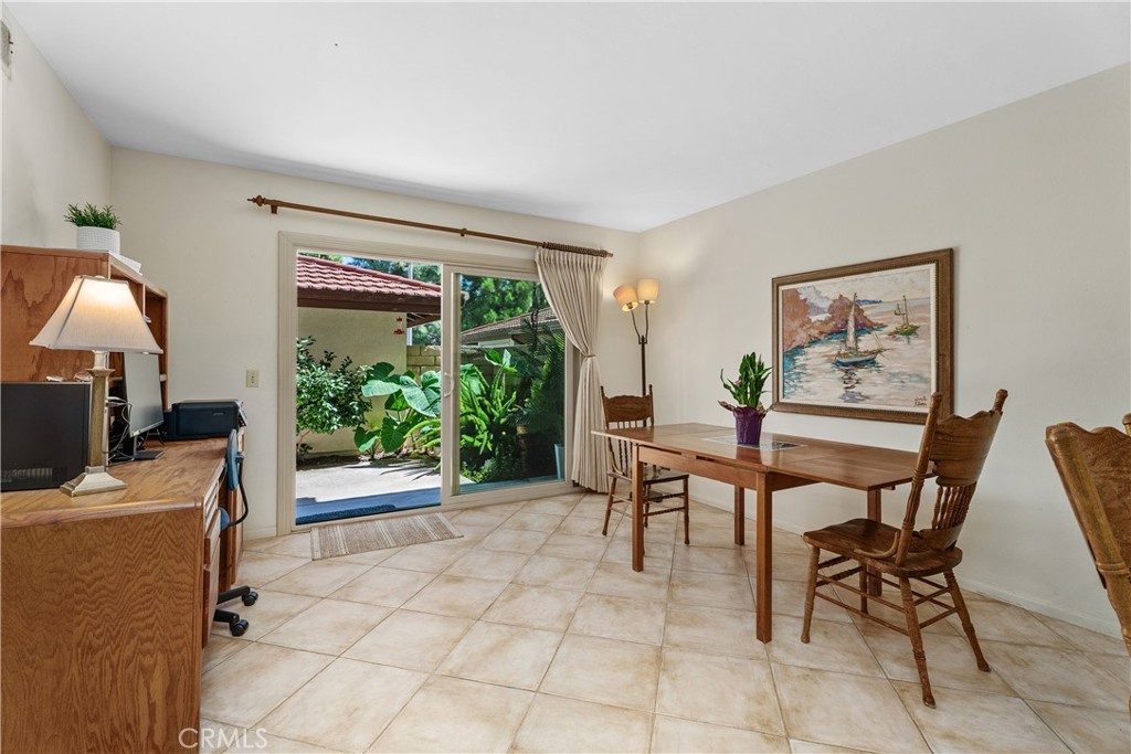 Breakfast nook with slider to the front courtyard - 25742 Shell Drive 189, Dana Point CA 92629 - photo 19