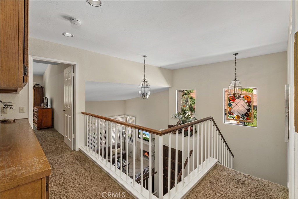 Upstairs landing overlooking the living room - 25742 Shell Drive 189, Dana Point CA 92629 - photo 25