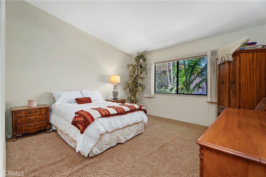 Primary bedroom with vaulted ceiling - 25742 Shell Drive 189, Dana Point CA 92629 - photo 26