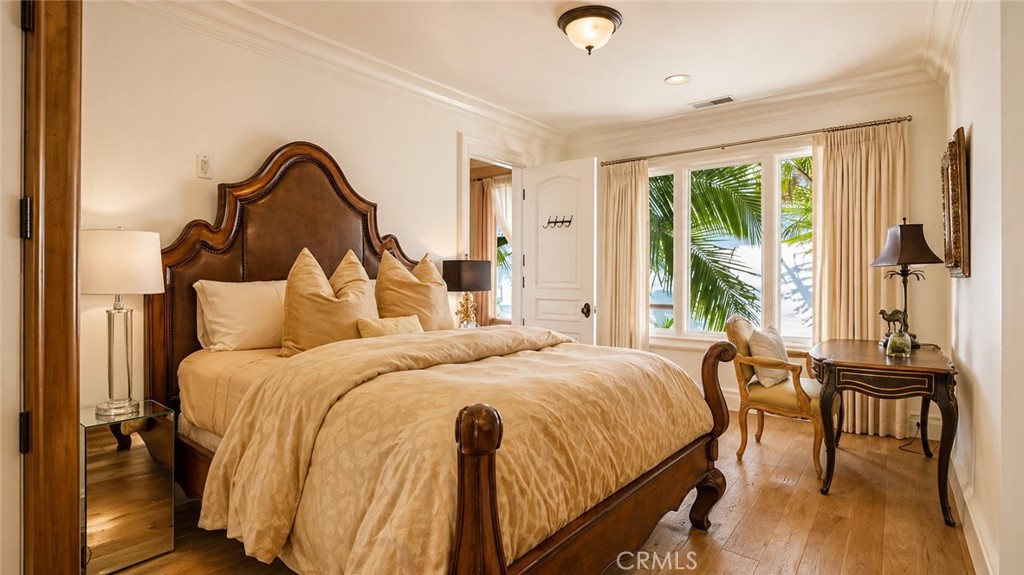 Bedroom 3 with wood flooring. - 26 RITZ COVE, Dana Point CA 92629 - photo 52