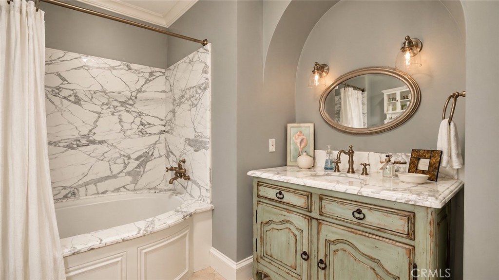 Guest Bath for Bedroom 2, with white slab marble shower walls. - 26 RITZ COVE, Dana Point CA 92629 - photo 56