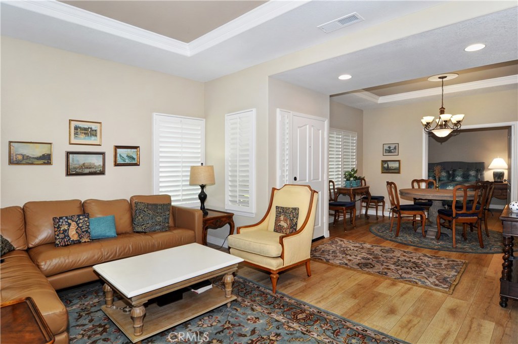 Gorgeous open floor plan. Wide plank flooring, vaulted ceilings. Separate dining and living space. - 26 Tennis Villas Drive, Dana Point CA 92629 - photo 1