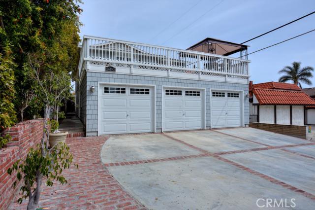 Great curb appeal with over-sized brick accented driveway. Premium hardie board siding on exterior is both attractive an - 26152 Via California, Dana Point CA 92624 - photo 1