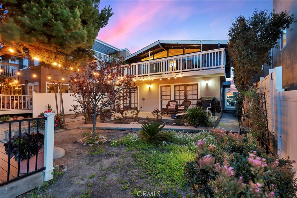 French doors open up to the backyard patio and deck. - 26305 Via California, Dana Point CA 92624 - photo 1
