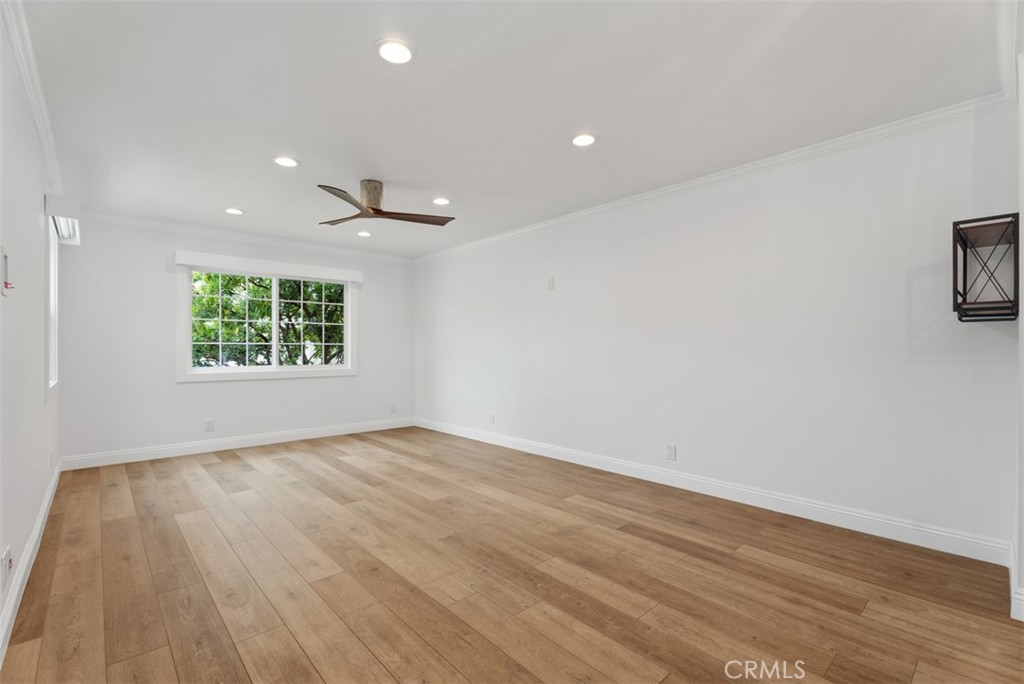 Family room opens to the kitchen creating a large great room. Many of the rooms have custom remote controlled window cov - 26882 Calle Real, Dana Point CA 92624 - photo 7