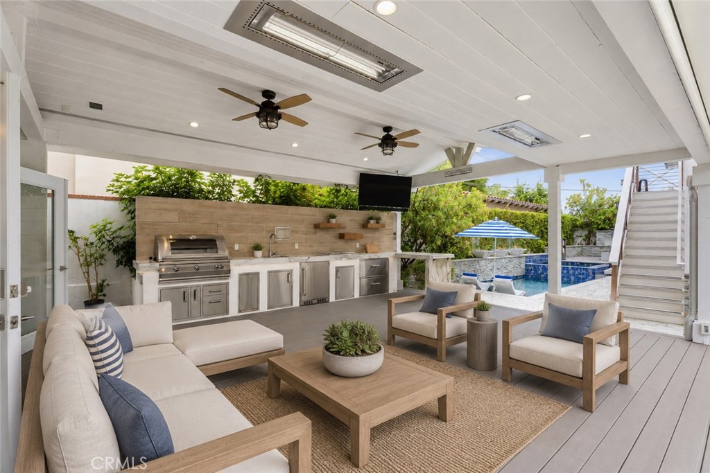Outdoor patio/living, add a table and enjoy dining as well. AI Staged - 26882 Calle Real, Dana Point CA 92624 - photo 16
