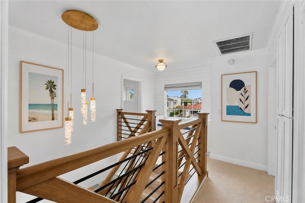 Landing upstairs. AI Staged - 26882 Calle Real, Dana Point CA 92624 - photo 22