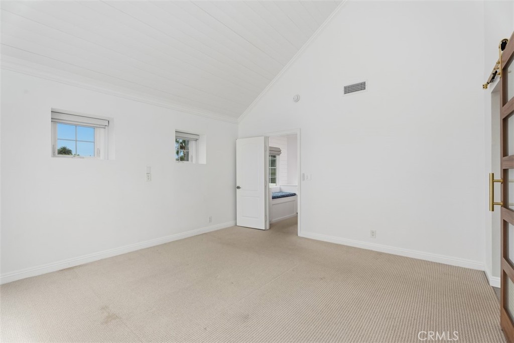 Primary Bedroom looking out to stair landing. - 26882 Calle Real, Dana Point CA 92624 - photo 32