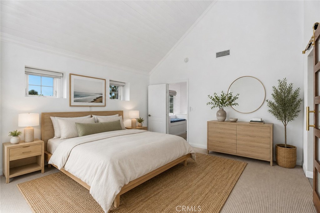 Primary Bedroom looking out to the stair landing. AI Staged - 26882 Calle Real, Dana Point CA 92624 - photo 33