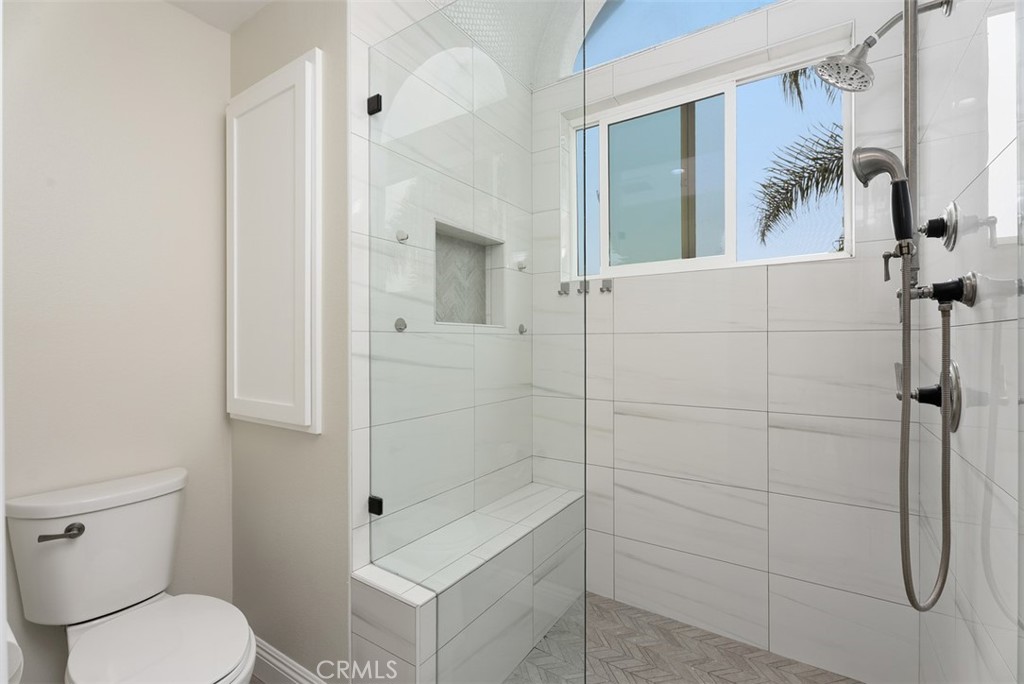 Primary Bathroom with linen closet for convienience, light and bright. - 26882 Calle Real, Dana Point CA 92624 - photo 36