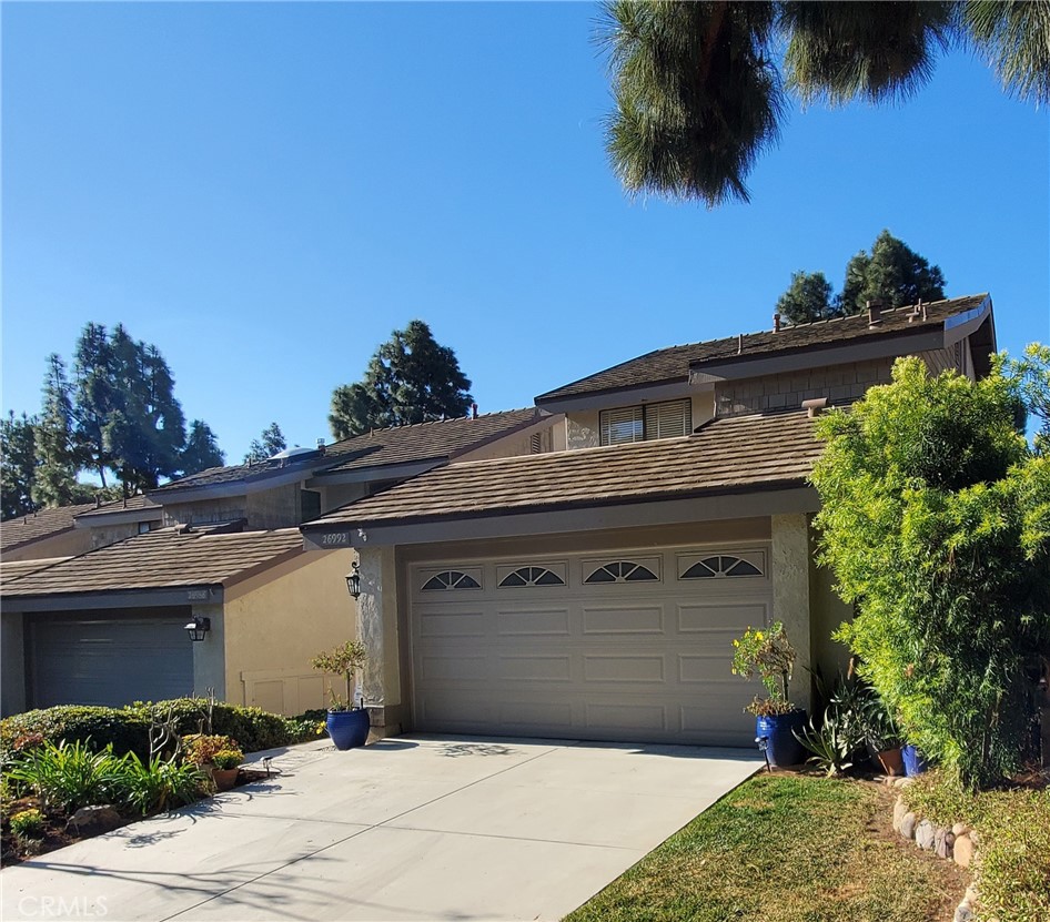 Front Elevation 2 car garage and 2 car driveway - 26992 Mill Pond Road 26, Dana Point CA 92624 - photo 1
