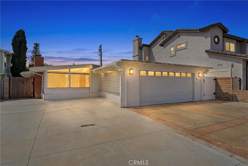 Front view of the property with extra parking in the driveway and in front of the house - 27081 Camino De Estrella, Dana Point CA 92624 - photo 1