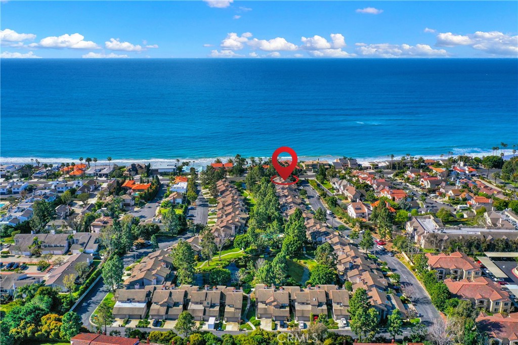 Location of property and ocean in the distance - 27112 Mill Pond W 2, Dana Point CA 92624 - photo 1