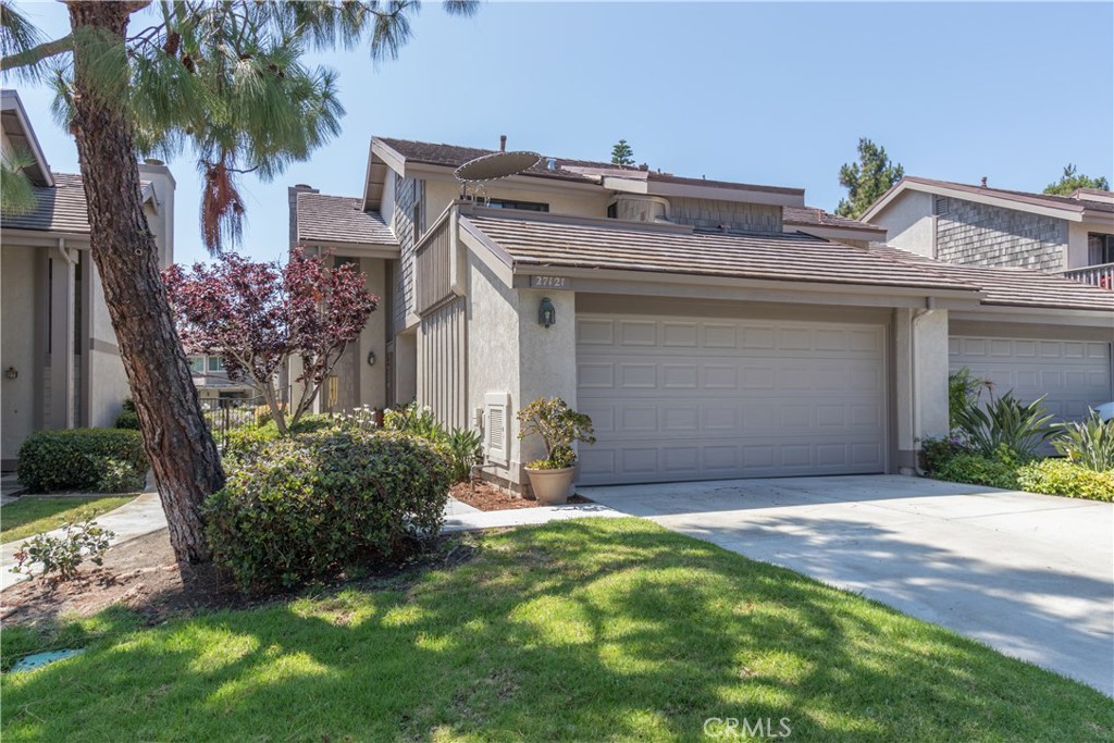 Highly upgraded peek ocean view home! Quiet, gated community with ponds, waterfalls and babbling creeks. - 27121 Mill Pond Road 54, Dana Point CA 92624 - photo 1