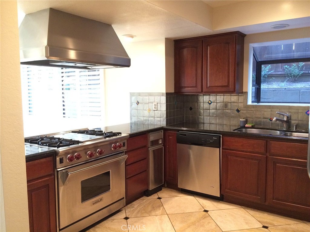 Open kitchen with Wolf range - 27631 Vista De Dons, Dana Point CA 92624 - photo 1
