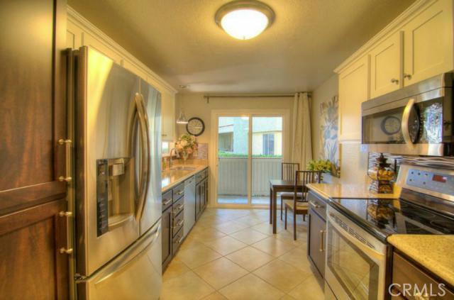 Kitchen with all new appliances, cabinets re-faced, new light fxtures, plugs, new granite countertops, new door handles - 28 Corniche Drive D, Dana Point CA 92629 - photo 1