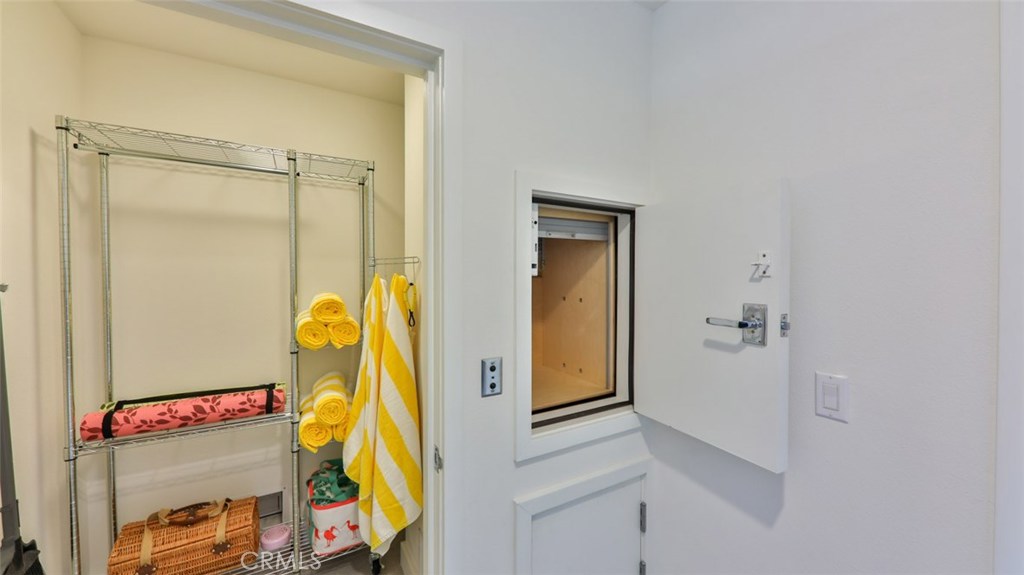 Renters closet and dumb waiter at entrance. - 2869 Doheny Way, Dana Point CA 92629 - photo 48