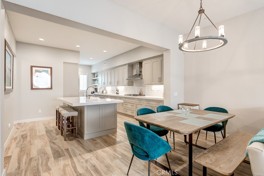 Dining is sweet under this lovely chandelier - 2978 Doheny Way, Dana Point CA 92629 - photo 1