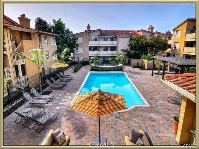 ALWAYS WARM POOL, WARM WATER SHOWERS, WORKOUT ROOM HERE TOO, SEE THE JACUZZI AT THE FAR MIDDLE? NICE! WiFi at the Pool. - 30 Corniche Drive J, Dana Point CA 92629 - photo 1