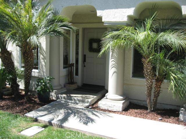 Private, end unit with lovely pygmy palms at entry. - 30 Wimbledon Court, Dana Point CA 92629 - photo 1