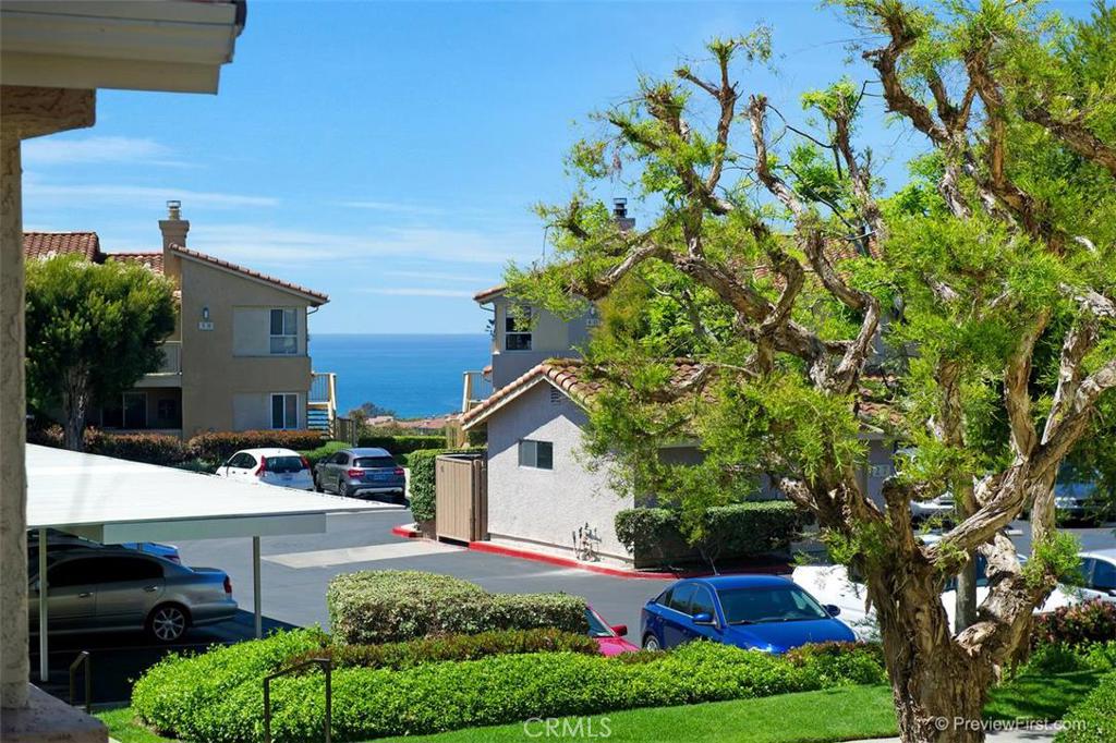 OCEAN VIEW FROM LIVING ROOM WINDOW - 32 Corniche Drive H, Dana Point CA 92629 - photo 1