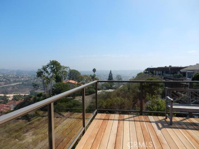 ENJOY SUNRISES AND BLAZING SUNSETS FROM THE NEW REDWOOD DECK OFF THE FAMILY ROOM, LIVING ROOM AND BEDROOM. - 32272 Azores Road, Dana Point CA 92629 - photo 1