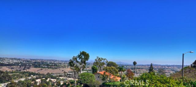 PHOTOS DONT DO THE VIEW JUSTICE, MOUNTAIN, GOLF COURSE, CITY LIGHT AND SOME OCEAN VIEW. - 32282 Azores Road, Dana Point CA 92629 - photo 1