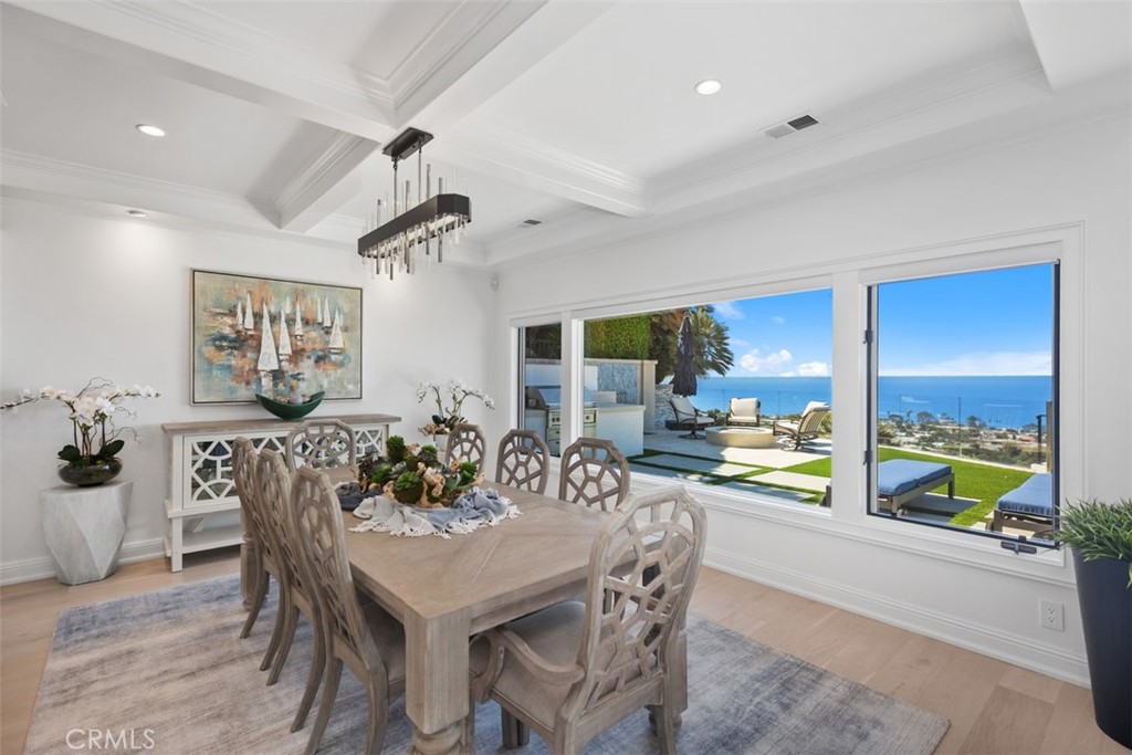 The stunning ocean view Dining room, shows off gorgeous white oak flooring all through entire residence. - 32311 Caribbean Drive, Dana Point CA 92629 - photo 1
