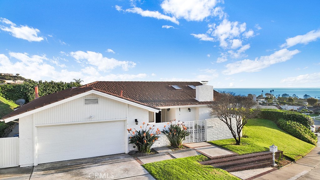 Charming single level home in Monarch Bay Terrace, Dana Point, overlooking the ocean in the front and back yard! - 32432 Seven Seas Drive, Dana Point CA 92629 - photo 1