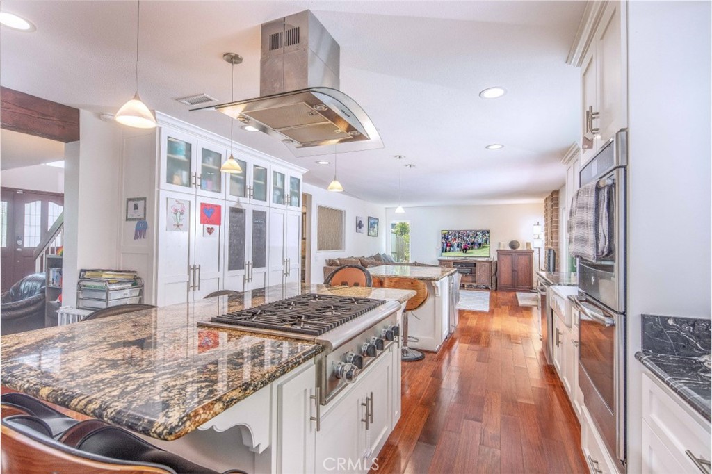 Gourmet kitchen with 2 granite top islands with seating around. - 32801 Shipside Drive, Dana Point CA 92629 - photo 1