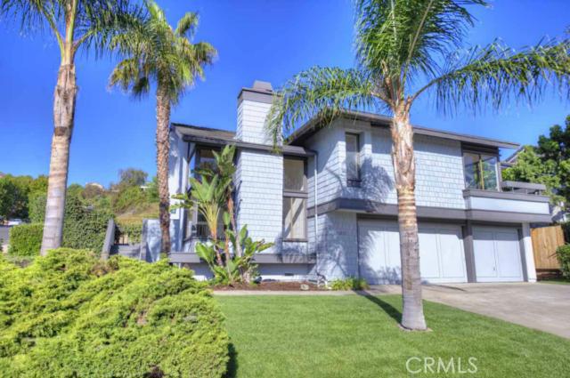 Situated on a large corner lot, this bold mid 70's modern exudes a strength of design that continues to the interior. - 32821 Mermaid Circle, Dana Point CA 92629 - photo 1