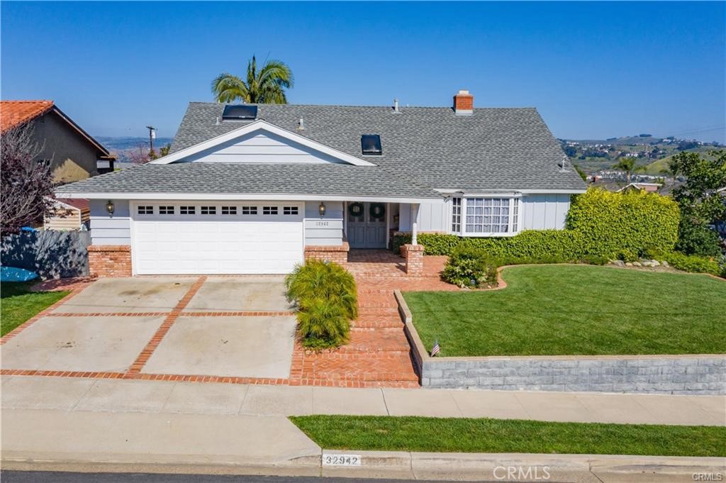 Turnkey Cape Cod style home on a large 8,200 sqft corner lot. - 32942 Barque Way, Dana Point CA 92629 - photo 1