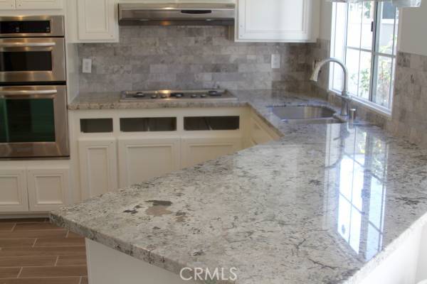 Brand new granite/backsplash/sink/faucet/ cabinets to be complete with modern handles - 33115 Ocean Ridge, Dana Point CA 92629 - photo 1