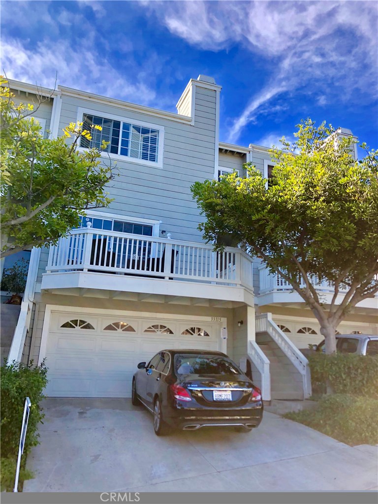 Front of unit. Brand New epoxy in two car garage with direct access. - 33115 Ocean Ridge, Dana Point CA 92629 - photo 1