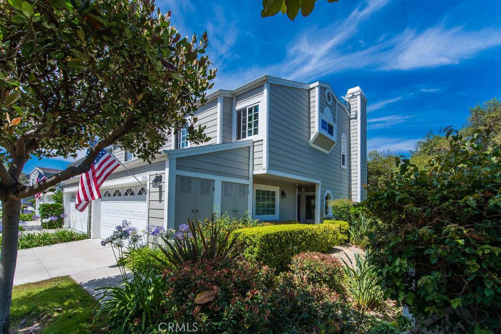 The exterior of 33166 Ocean Ridge on a beautiful corner lot. Located adjacent to the community spa. - 33166 Ocean Ridge, Dana Point CA 92629 - photo 1